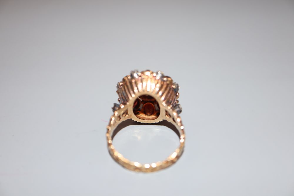 A 19th century 18ct, garnet and rose cut diamond set oval cluster ring, size O, gross 7 grams,